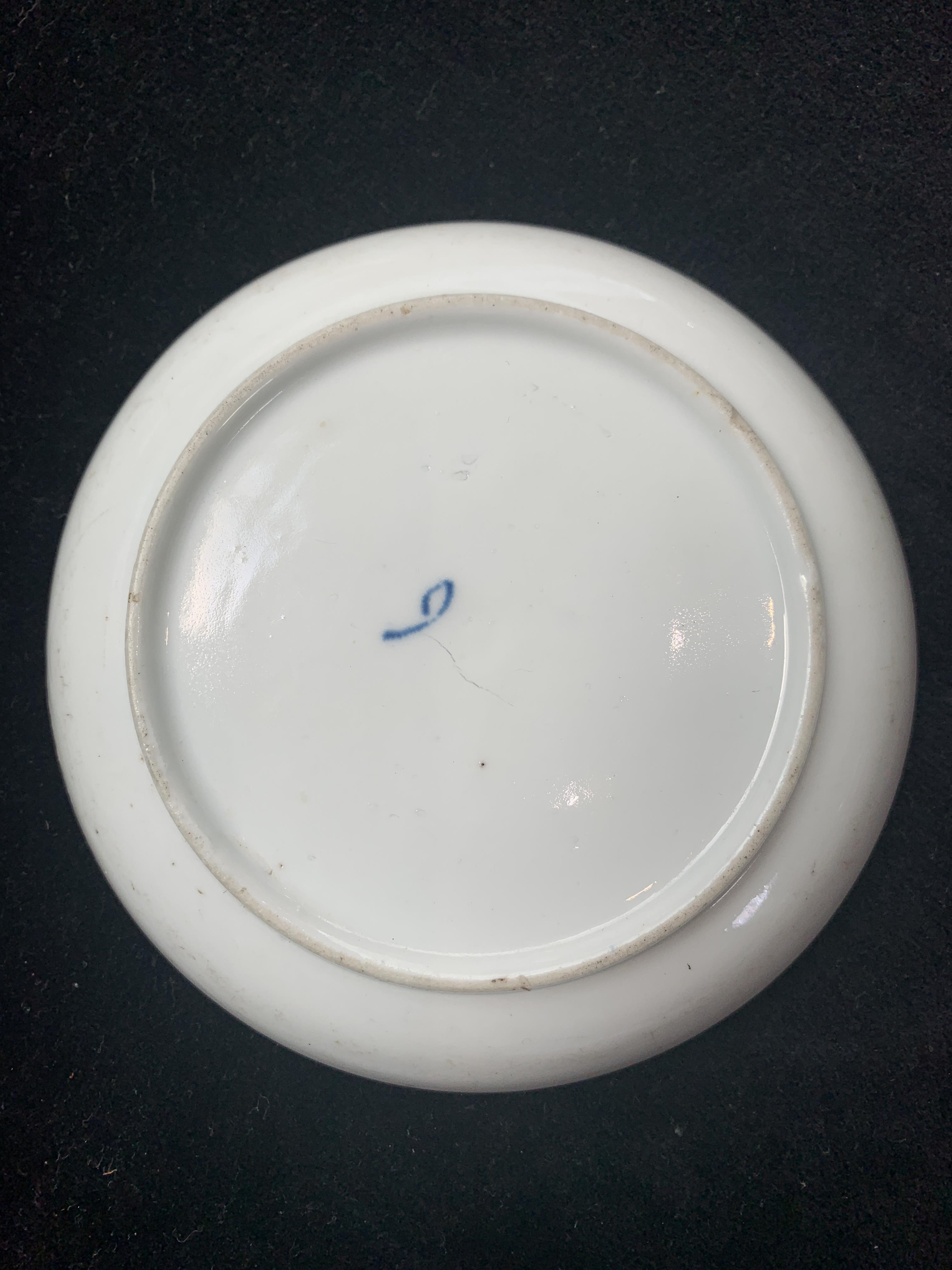 Lot 850 - A rare Longton Hall blue and white saucer,