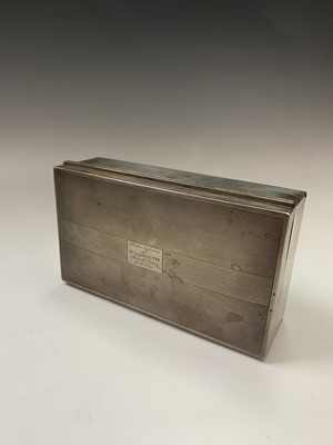 Lot 82 - An engine-turned silver cigarette box