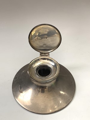 Lot 17 - A filled silver capstan inkwell two silver...