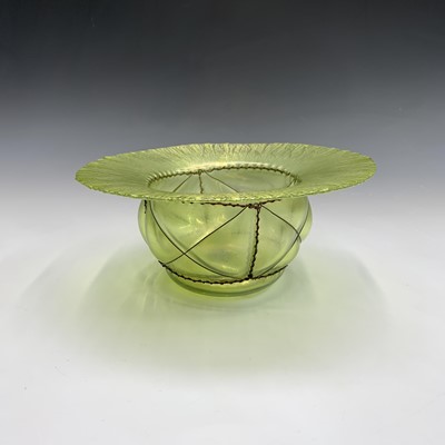 Lot 813 - A Tiffany style iridescent green glass bowl,...