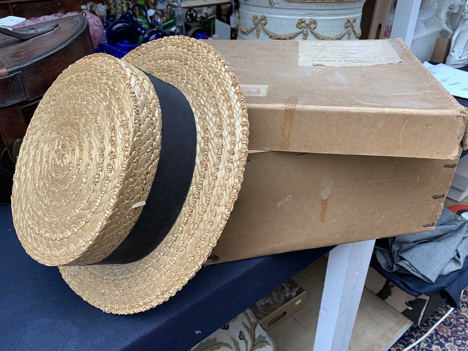 Lot 2842 - A classic straw boater size 73/8 (60). In a...