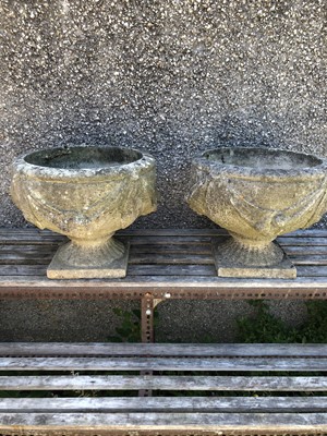Lot 72 - A pair of Haddonstone garden urns of classical...