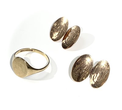 Lot 2427 - A pair of 9ct gold cufflinks and a 9ct gold...