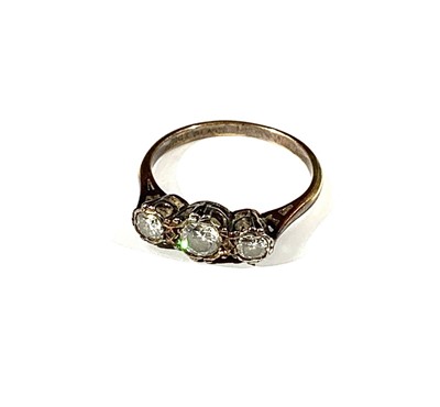 Lot 2394 - An 18ct gold three stone diamond ring