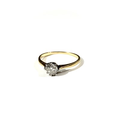 Lot 309 - An 18ct gold ring set with a solitaire diamond...