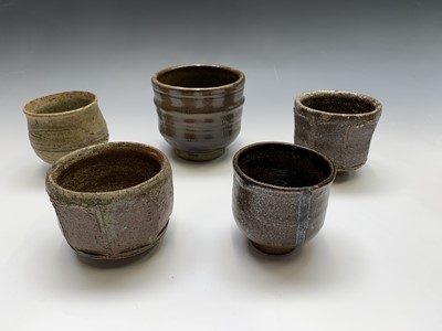 Lot 929 - A collection of seven studio pottery tea bowls,...