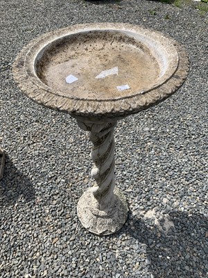 Lot 307 - A reconstituted stone birdbath, on column...