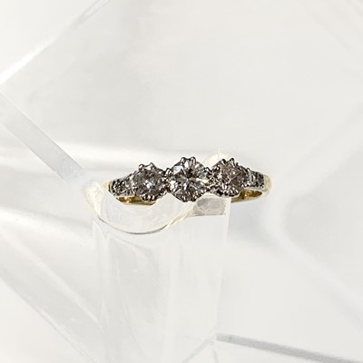 Lot 2345 - An 18ct gold three stone diamond ring