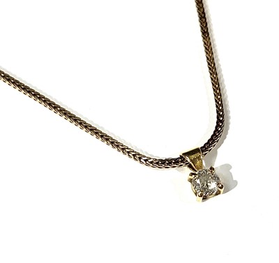 Lot 2389 - A diamond solitaire pendant on 9ct chain