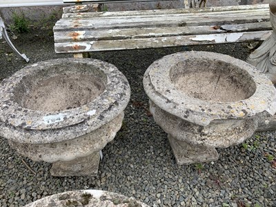 Lot 284 - A pair of concrete urns