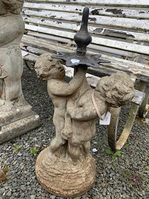 Lot 275 - A concrete fountain with two cherubs...