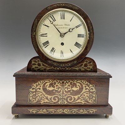 Lot 2911 - A Regency rosewood drum mantel clock, the dial...