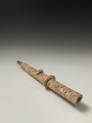 Lot 117 - A Japanese ivory tanto, Meiji Period, the...
