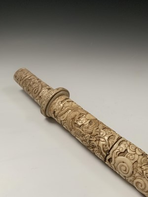 Lot 117 - A Japanese ivory tanto, Meiji Period, the...