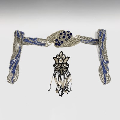 Lot 2805 - An early 20th century heavily beaded belt in...