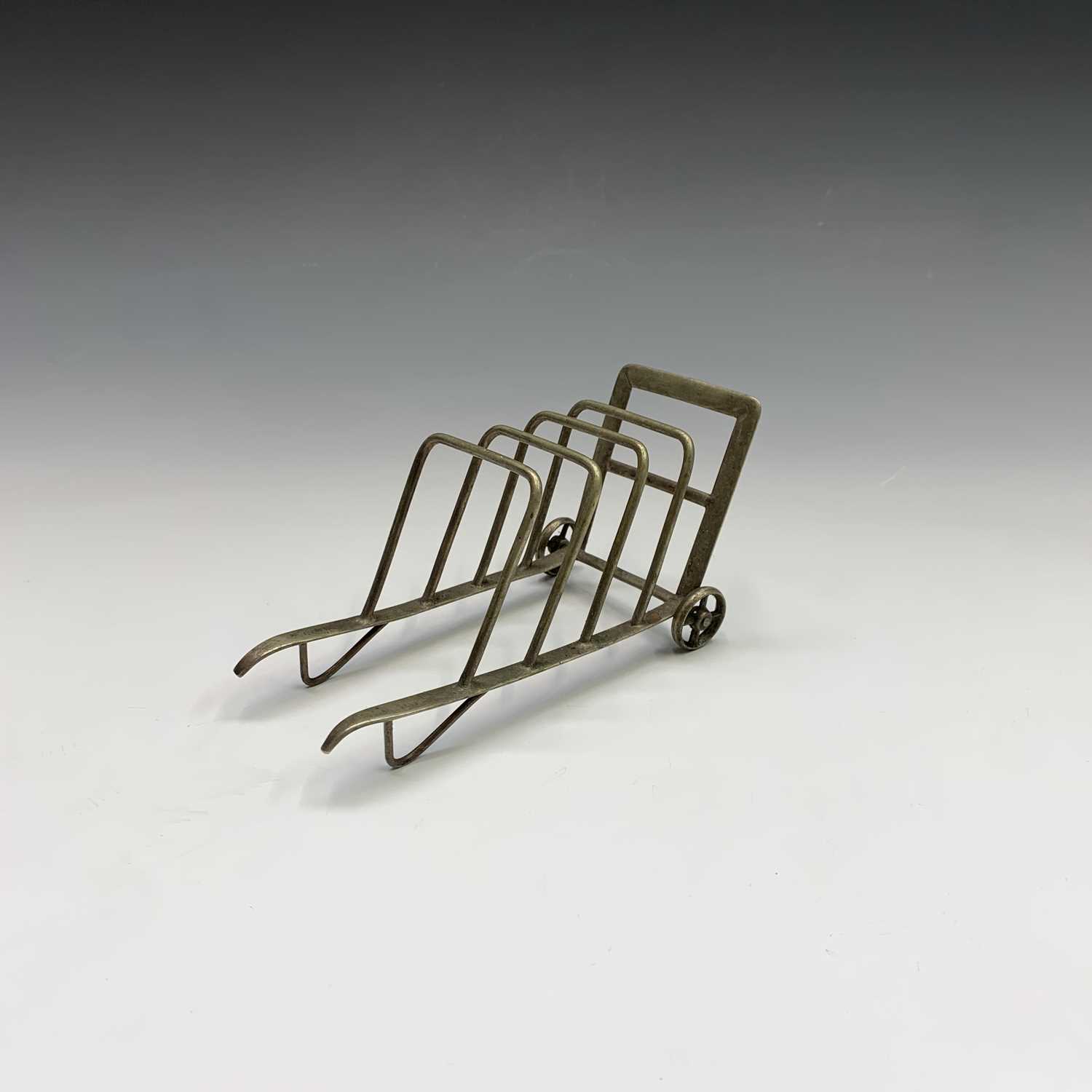 Lot 6 - An unusual EPNS toast or letter rack, shaped...