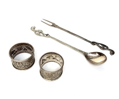 Lot 2034 - A pair of Indian silver napkin rings and a...