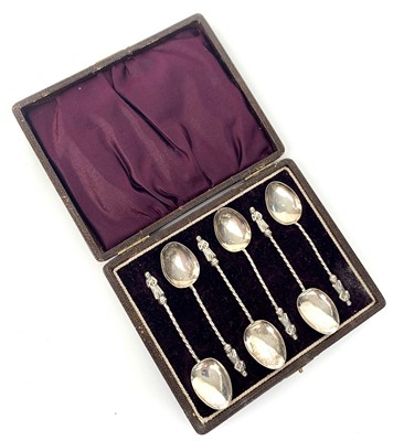 Lot 2044 - A set of six silver coffee spoons with apostle...