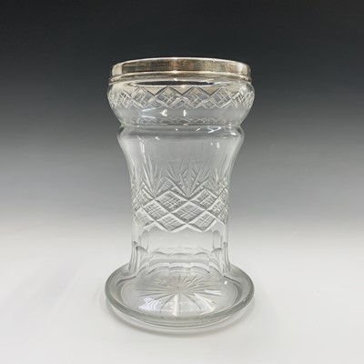 Lot 916 - A cut glass vase with hallmarked silver rim....