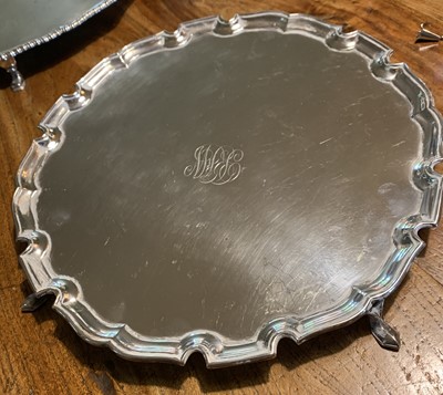 Lot 67 - A silver tray with plain shaped border by...