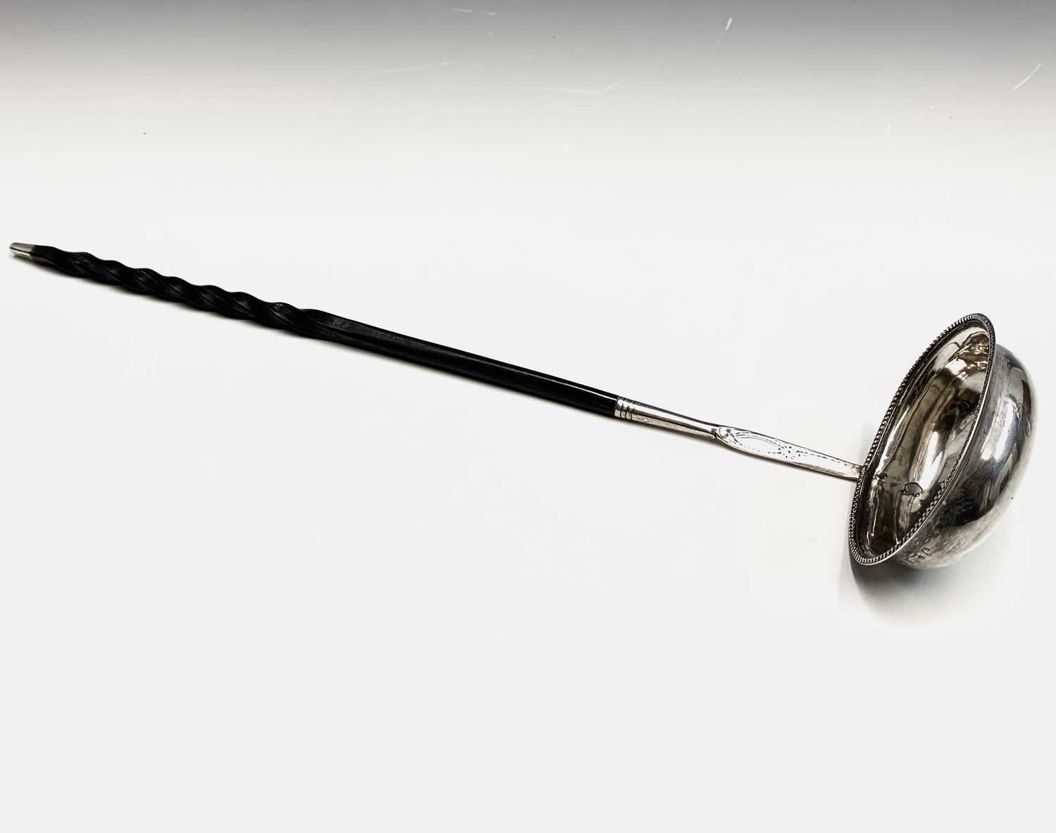 Lot 41 - A George lll silver punch ladle London 1792