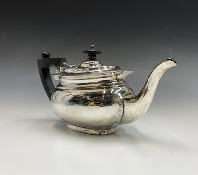 Lot 83 - A silver small oval section teapot and similar...