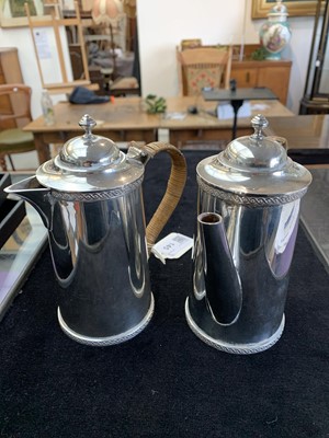 Lot 145 - A pair of silver pots, one for coffee the...
