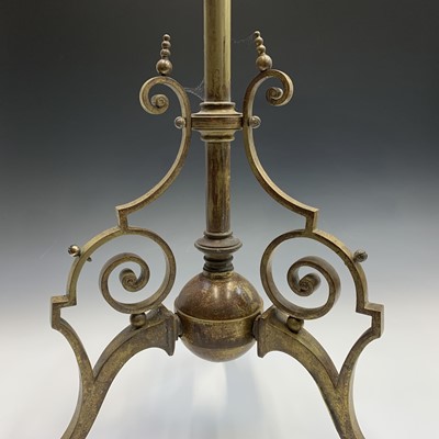 Lot 405 - A Victorian brass lamp stand with scrolled...