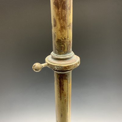 Lot 405 - A Victorian brass lamp stand with scrolled...