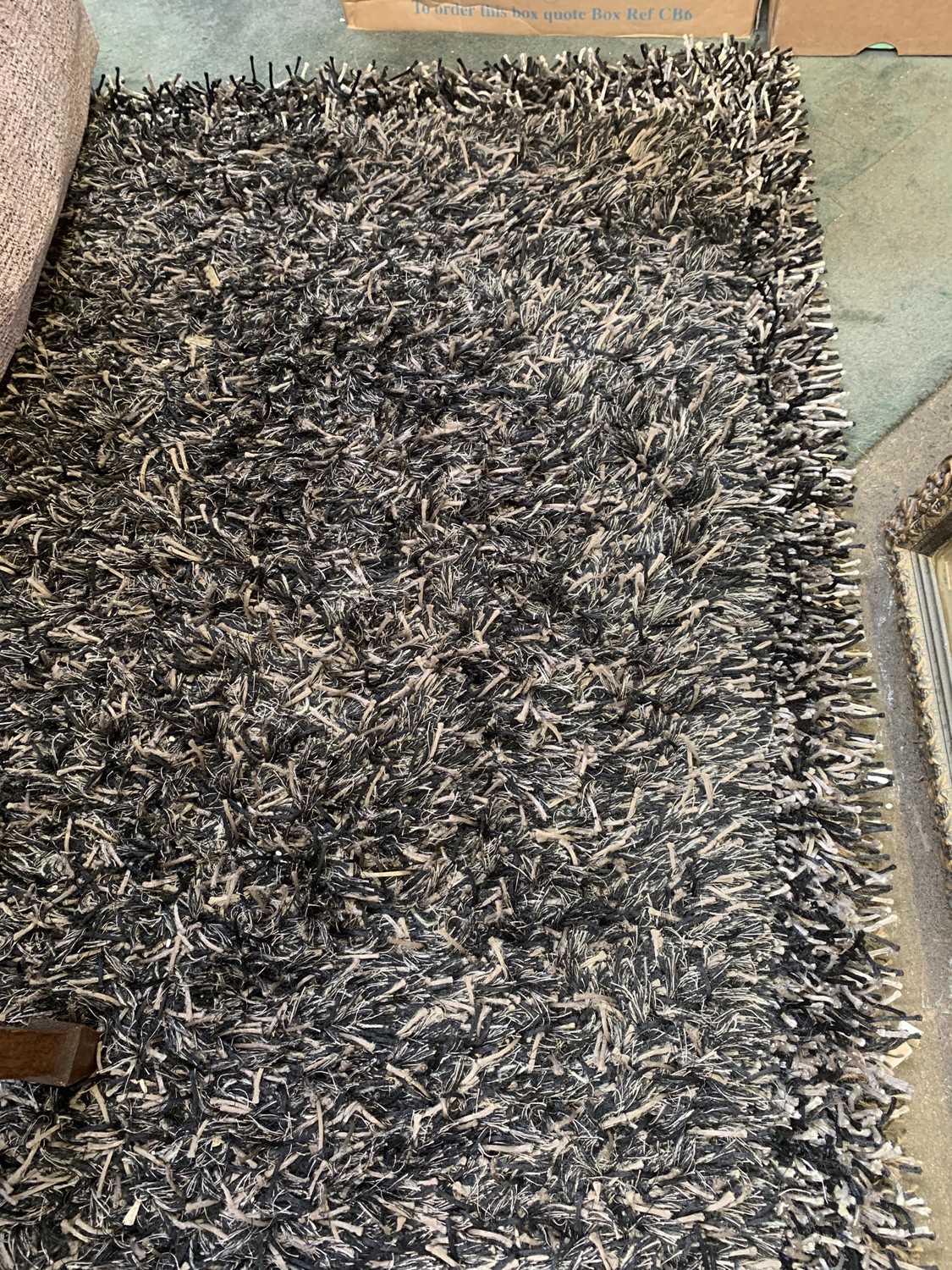 Lot 487 Two brown shaggy rugs