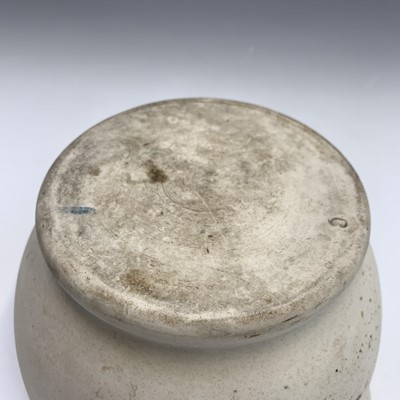 Lot 56 - A pestle and mortar. Height of mortar 11cm,...