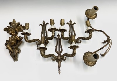 Lot 547 - A trio of gilt brass twin sconce wall lights,...