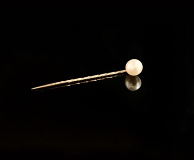 Lot 613 - A Victorian stickpin the finial an 8.5mm pearl,...