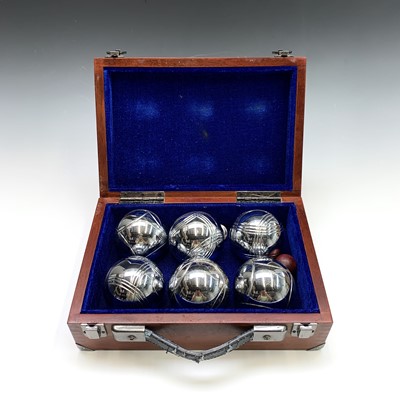 Lot 14 - A set of chrome boules, with jack in a wooden...