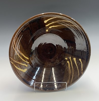 Lot 905 - A Clive Bowen (b.1943) studio pottery slipware...