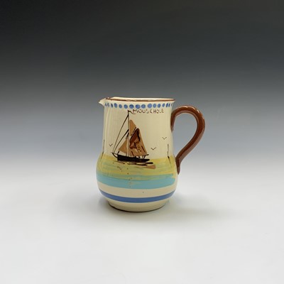 Lot 945 - A Watcombe Torquay Mottoware pottery tea and...