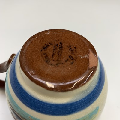 Lot 945 - A Watcombe Torquay Mottoware pottery tea and...