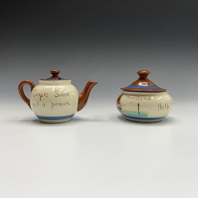 Lot 945 - A Watcombe Torquay Mottoware pottery tea and...