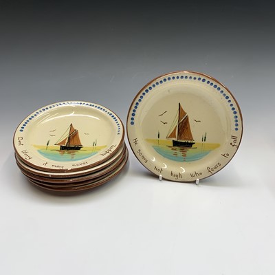Lot 945 - A Watcombe Torquay Mottoware pottery tea and...