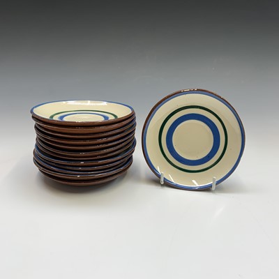 Lot 945 - A Watcombe Torquay Mottoware pottery tea and...