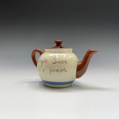 Lot 945 - A Watcombe Torquay Mottoware pottery tea and...
