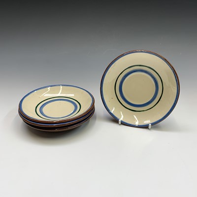Lot 945 - A Watcombe Torquay Mottoware pottery tea and...