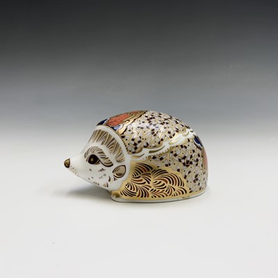 Lot 825 - Four Royal Crown Derby hedgehog paperweights -...