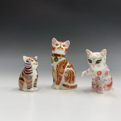 Lot 828 - Three Royal Crown Derby cat paperweights -...