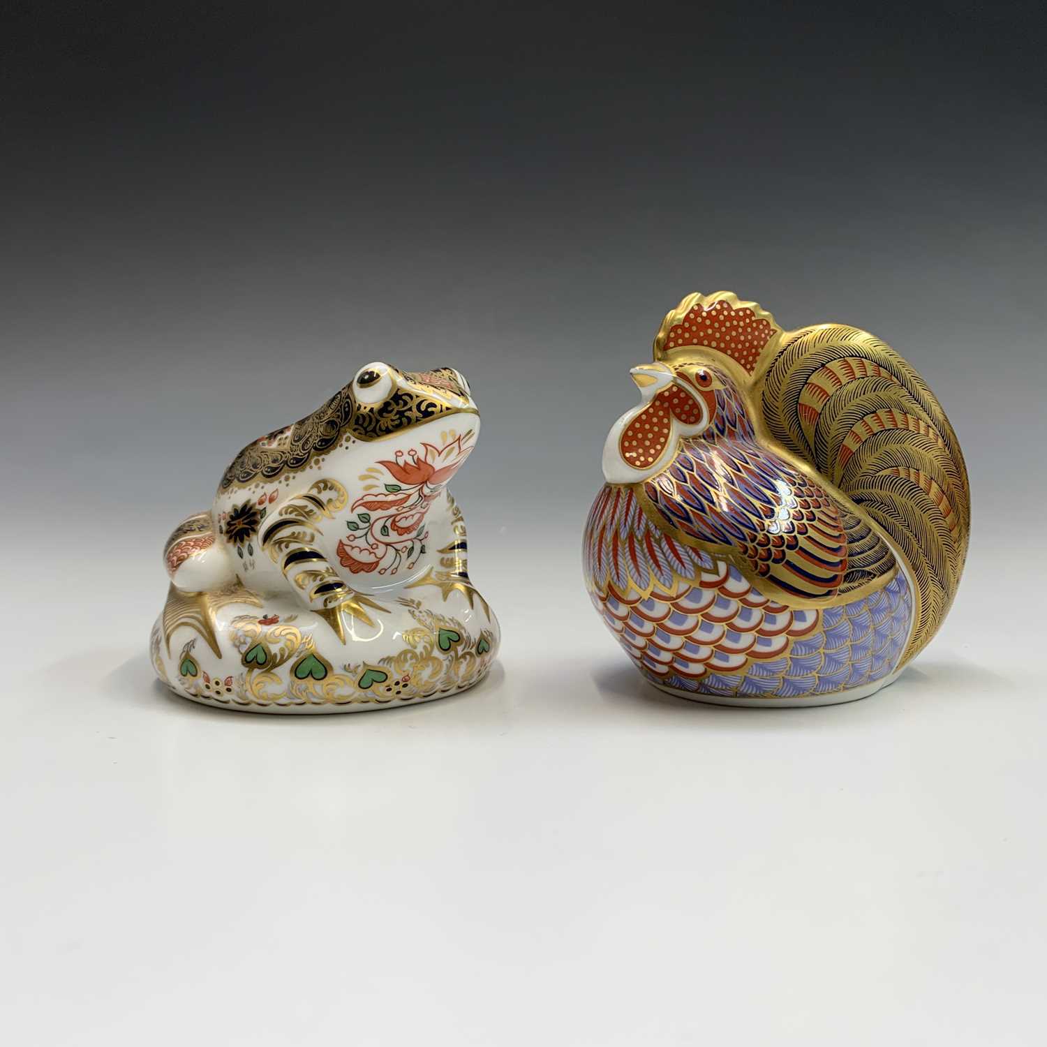 Lot 831 - Two Royal Crown Derby paperweights - 'Old