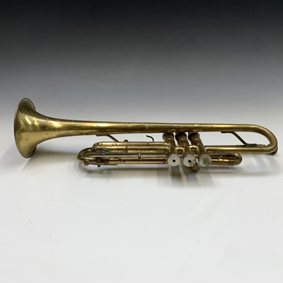 Lot 34 - A B&M champion brass trumpet. Length 50.5cm.