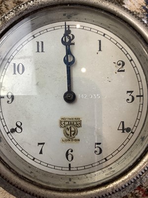 Lot 13 - A Smiths motoring dashboard clock, the black...