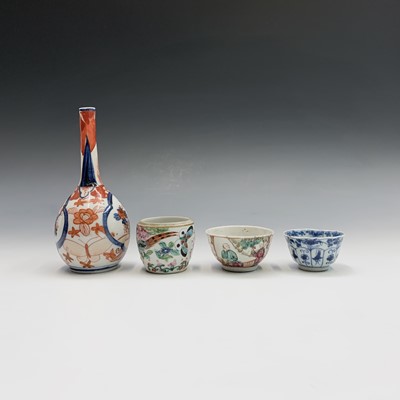 Lot 821 - A 19th century Cantonese famille rose tea bowl,...