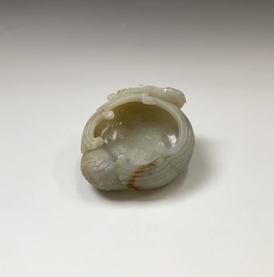 Lot 22 - A Chinese carved jade brush pot, 18th century,...