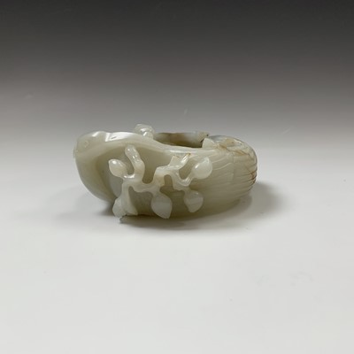 Lot 22 - A Chinese carved jade brush pot, 18th century,...